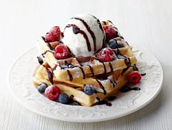 belgian waffles with ice cream and chocolate drizzle